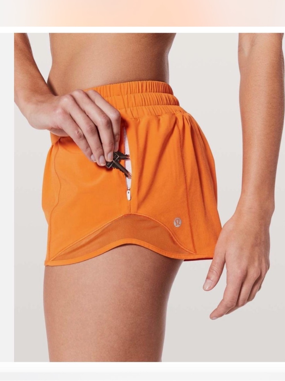 Lululemon Hotty Hot High-Rise Lined Short 4"
Lit Orange